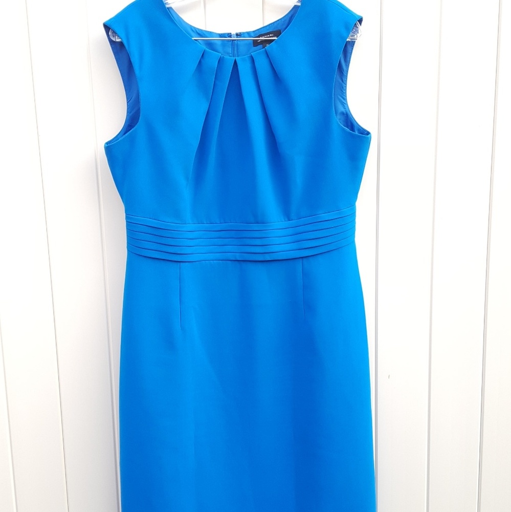 Blue sleeveless dress.